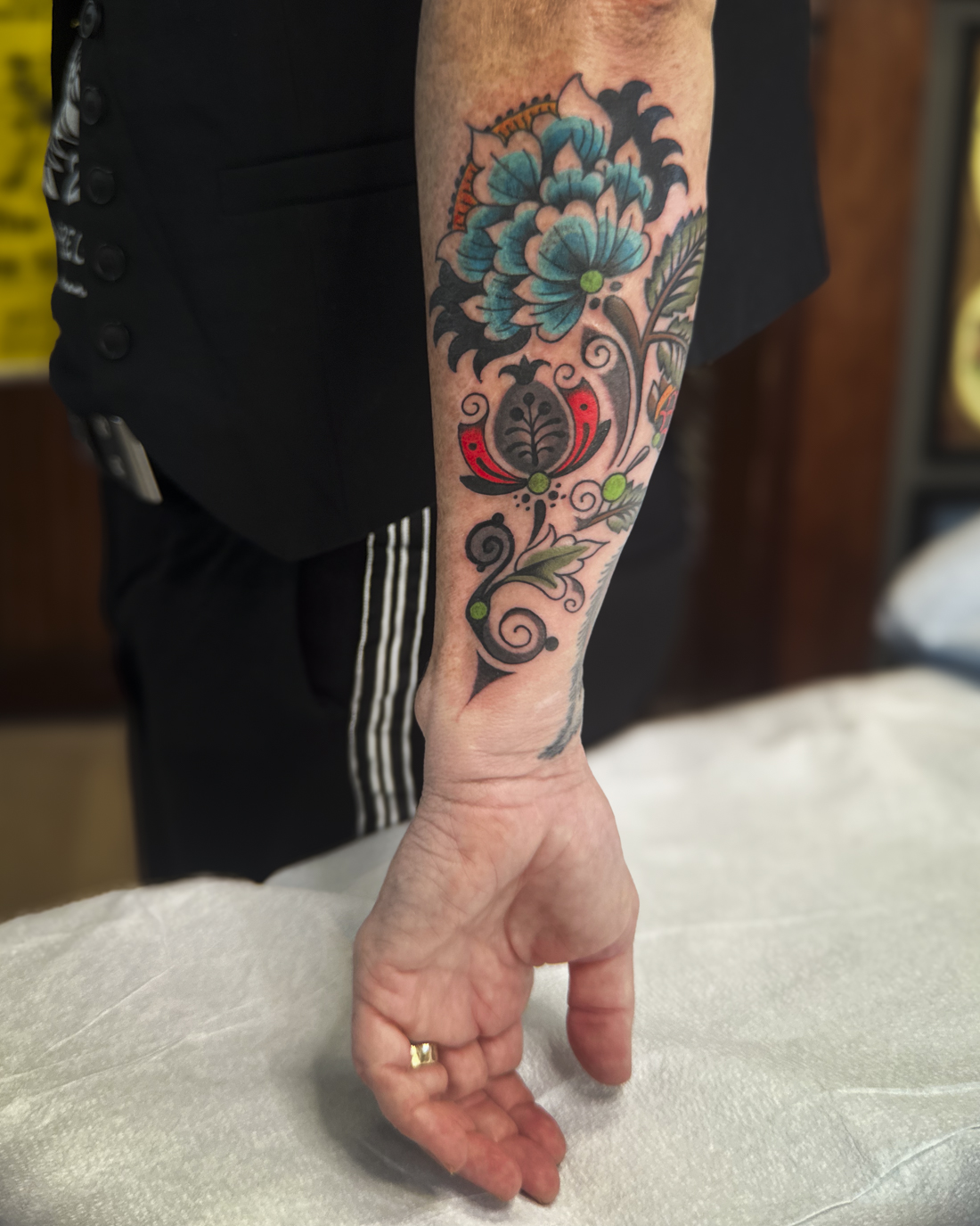 An artist's station inside Atlas Tattoo Studio