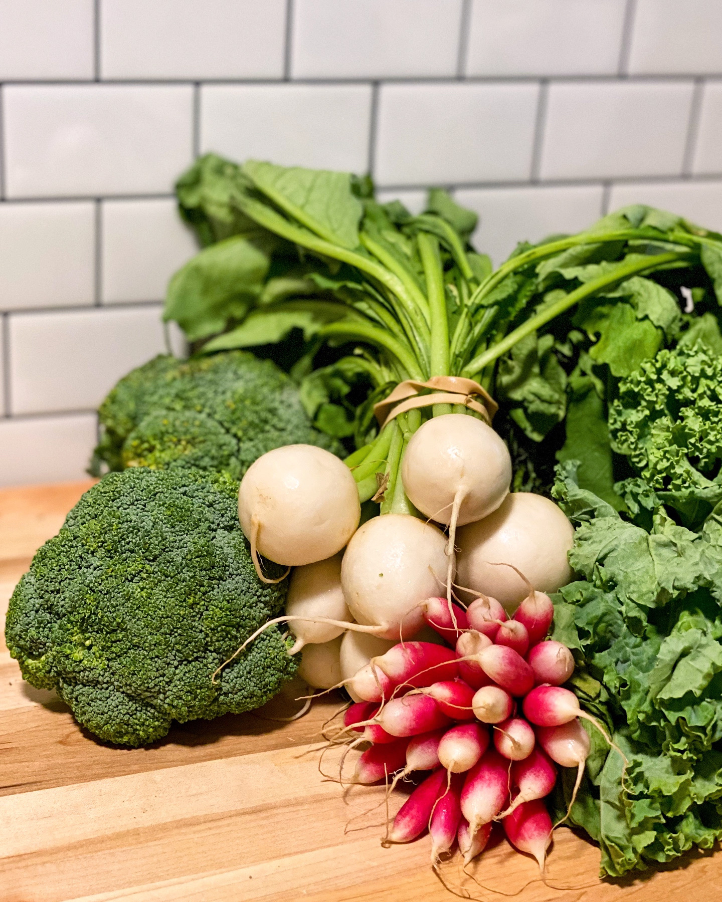 Fresh produce and prepared dishes at Farm To Table in Austin